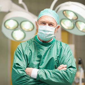 surgeon standing in a surgical operating room