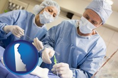 delaware map icon and general surgeons preparing for surgery